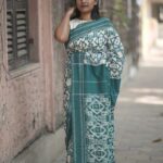 Green Telia Rumal double ikat cotton saree handwoven in traditional pattern