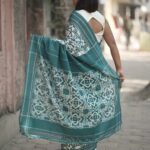 Handwoven Green Telia Rumal saree showcasing double ikat geometric motifs