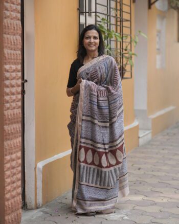 Maroon, blue, and black horizontal striped Maheshwari saree with traditional Bagh hand-block printed borders.