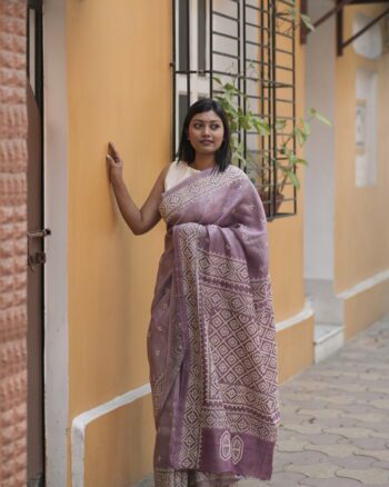 Mauve tussar silk saree with beige Gujarati hand embroidery