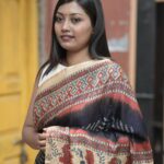 Handcrafted Bandhej Ajrakh silk saree in midnight blue with rich detailing