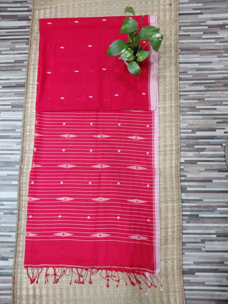 Handwoven red Jamdani saree featuring delicate small buta design