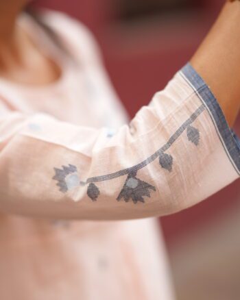 Peach handwoven Jamdani cotton top with delicate woven motifs