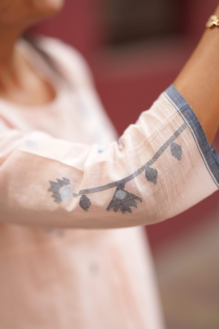 Peach handwoven Jamdani cotton top with delicate woven motifs