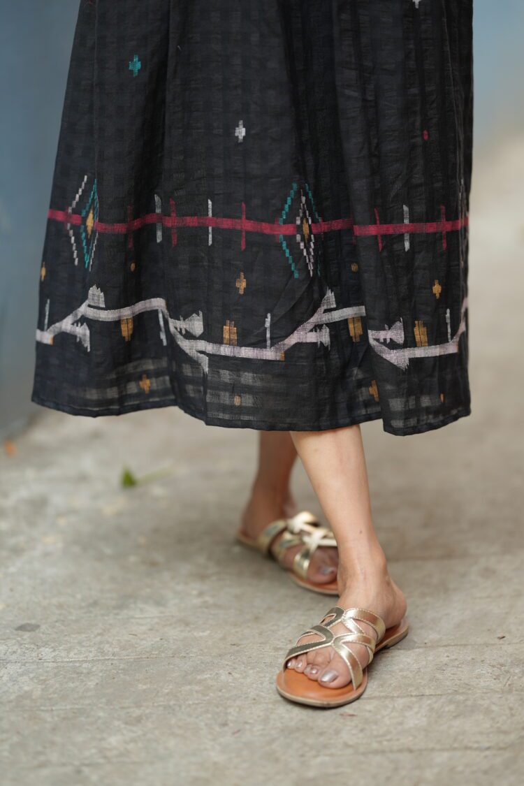Black Jamdani dress made using traditional handloom weaving technique