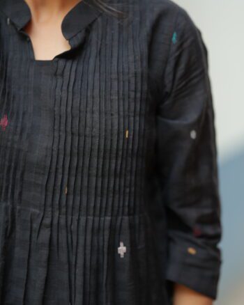 Black Jamdani dress made using traditional handloom weaving technique