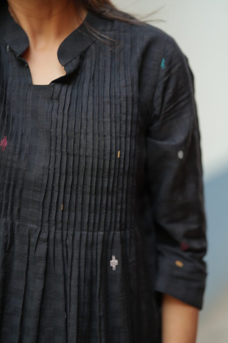 Black Jamdani dress made using traditional handloom weaving technique