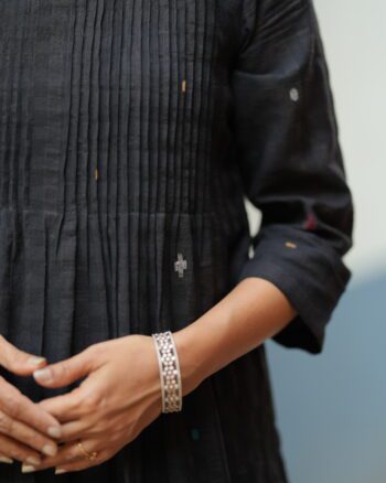 Black Jamdani dress made using traditional handloom weaving technique