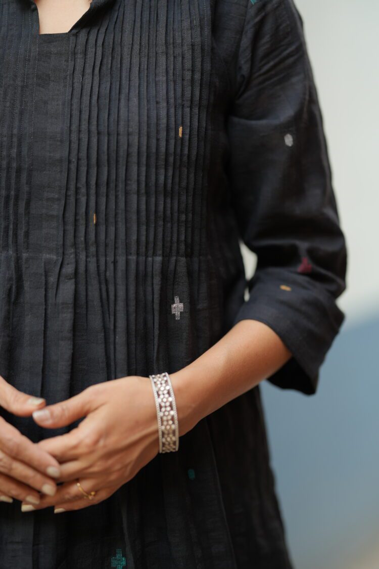 Black Jamdani dress made using traditional handloom weaving technique